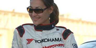 Nadine Sachiko Hsu, professional race car driver in her car suit.