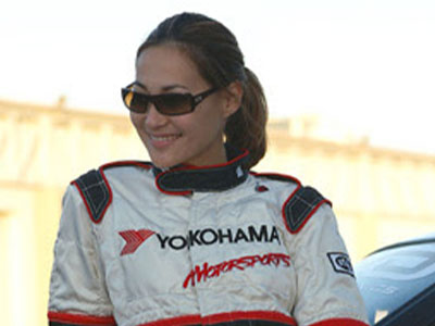 Nadine Sachiko Hsu, professional race car driver in her car suit.