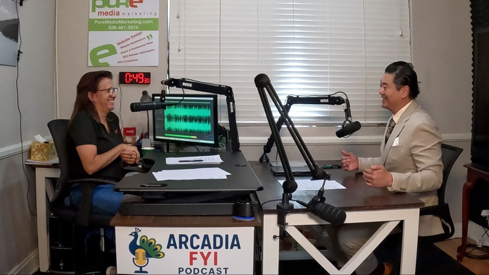 Christine Zito, host of Arcadia FYI and City Councilman Paul P. Chang laugh during interview at Pure Studios in Arcadia.