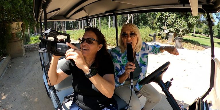 Sylvia Rosenberger, Chief Development Officer of the Los Angeles Arboretum Foundation, Inc. showing Christine Zito of Arcadia FYI places in the Arboretum.